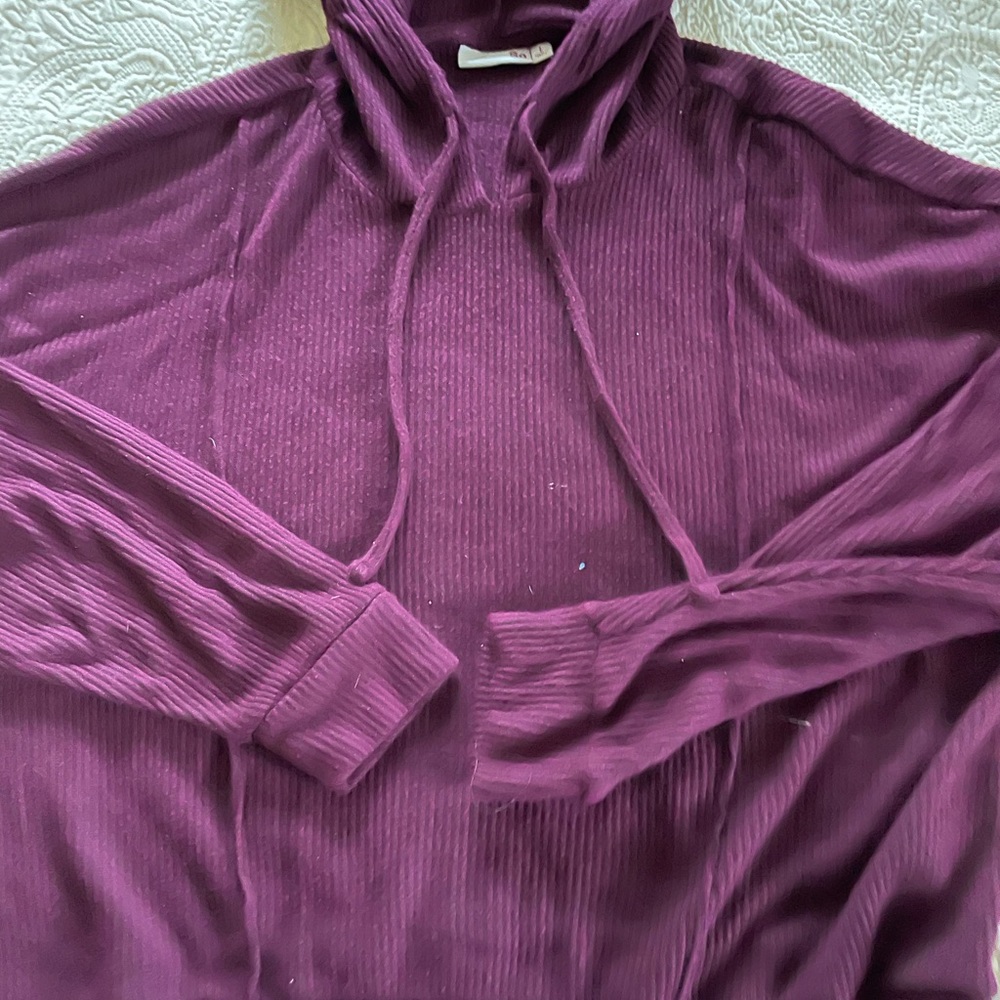 purple hooded shirt